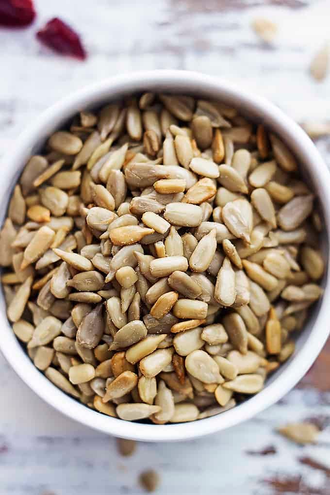 top view of a small bowl of sunflower seeds.