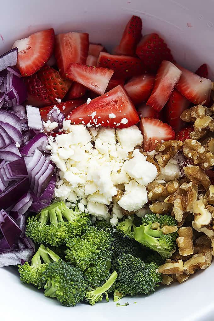 close up of strawberry broccoli salad ingredients unmixed.