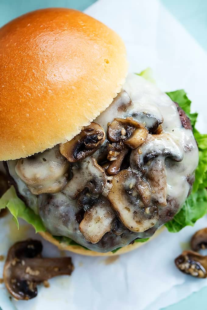 top view of a mushroom swiss burger with the top slide off on the side.