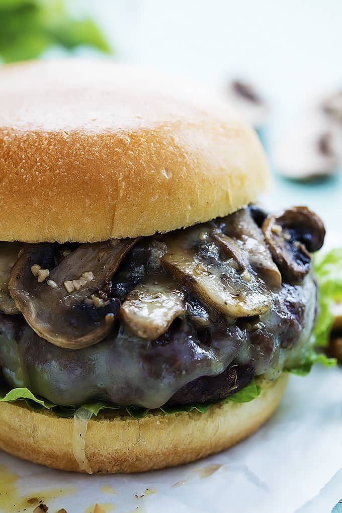 close up of a mushroom swiss burger.