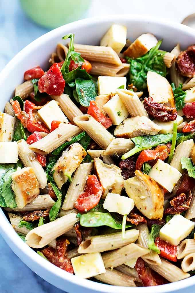 top view of chicken penne salad with creamy parmesan dressing in a bowl.