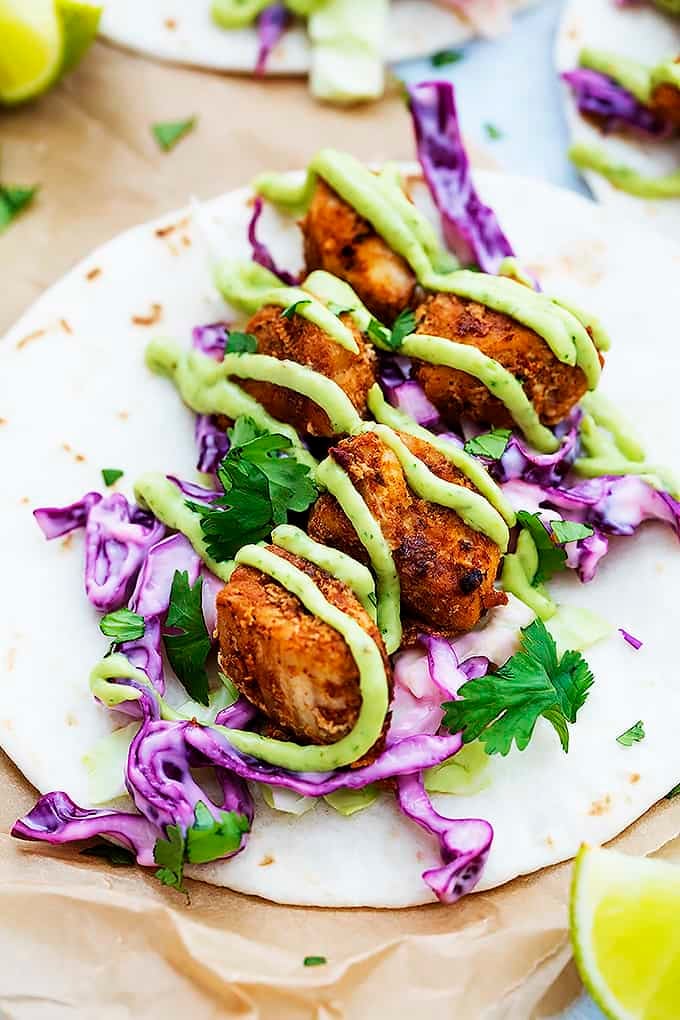 close up of an opened baja fish taco.