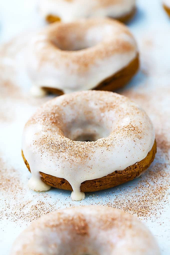 close up of baked pumpkin donuts.