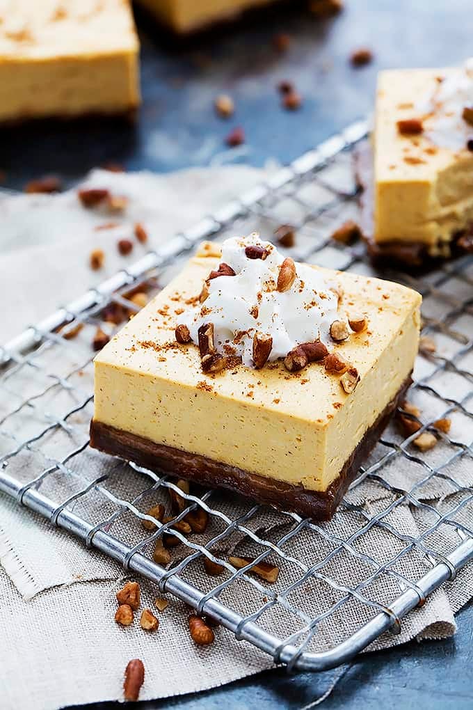 Pumpkin Cheesecake Bars with Gingersnap Crust | Creme De La Crumb