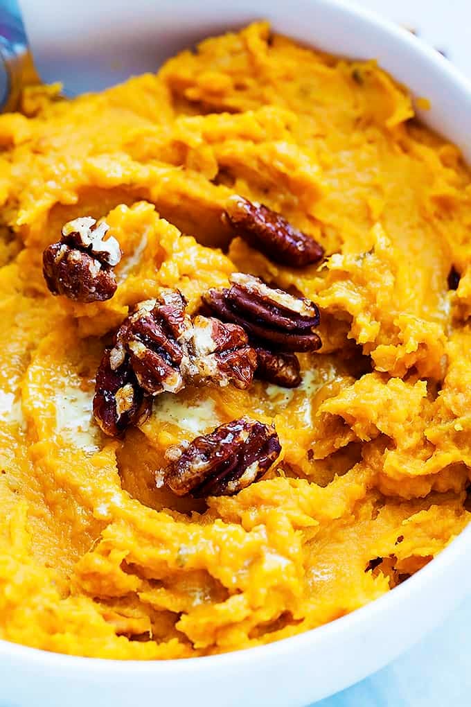 close up of slow cooker mashed sweet potatoes in a bowl.