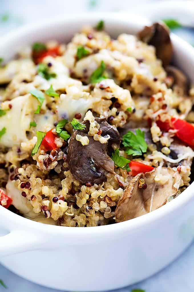 close up of slow cooker cheesy mushroom quinoa in a bowl.