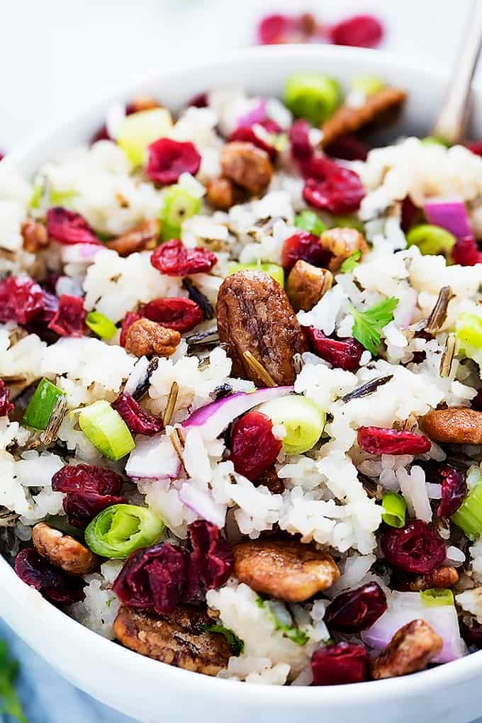 close up of cranberry pecan wild rice salad in a bowl.