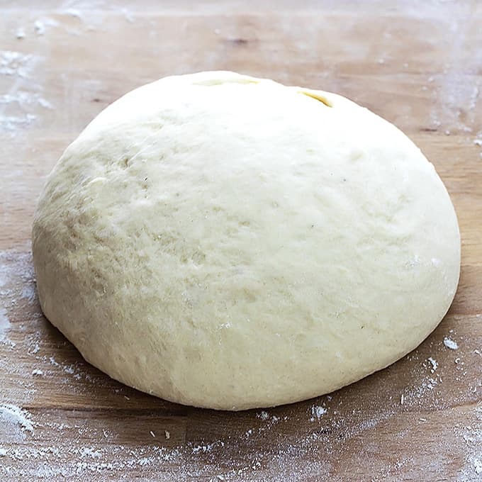 a ball of mashed potato cinnamon rolls dough.