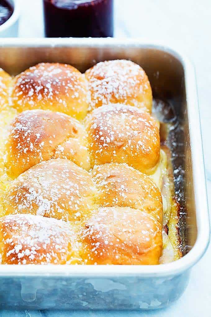 baked Monte Cristo party sliders in a baking pan.