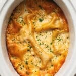 cooked white chicken lasagna in slow cooker.