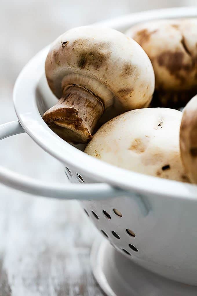 mushrooms in a colander.