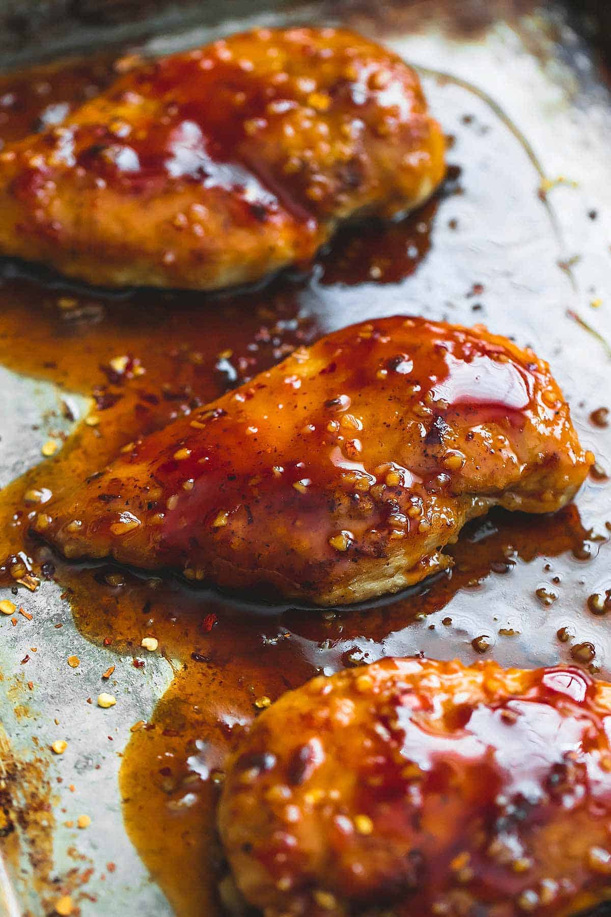 close up of baked sweet & spicy chicken.