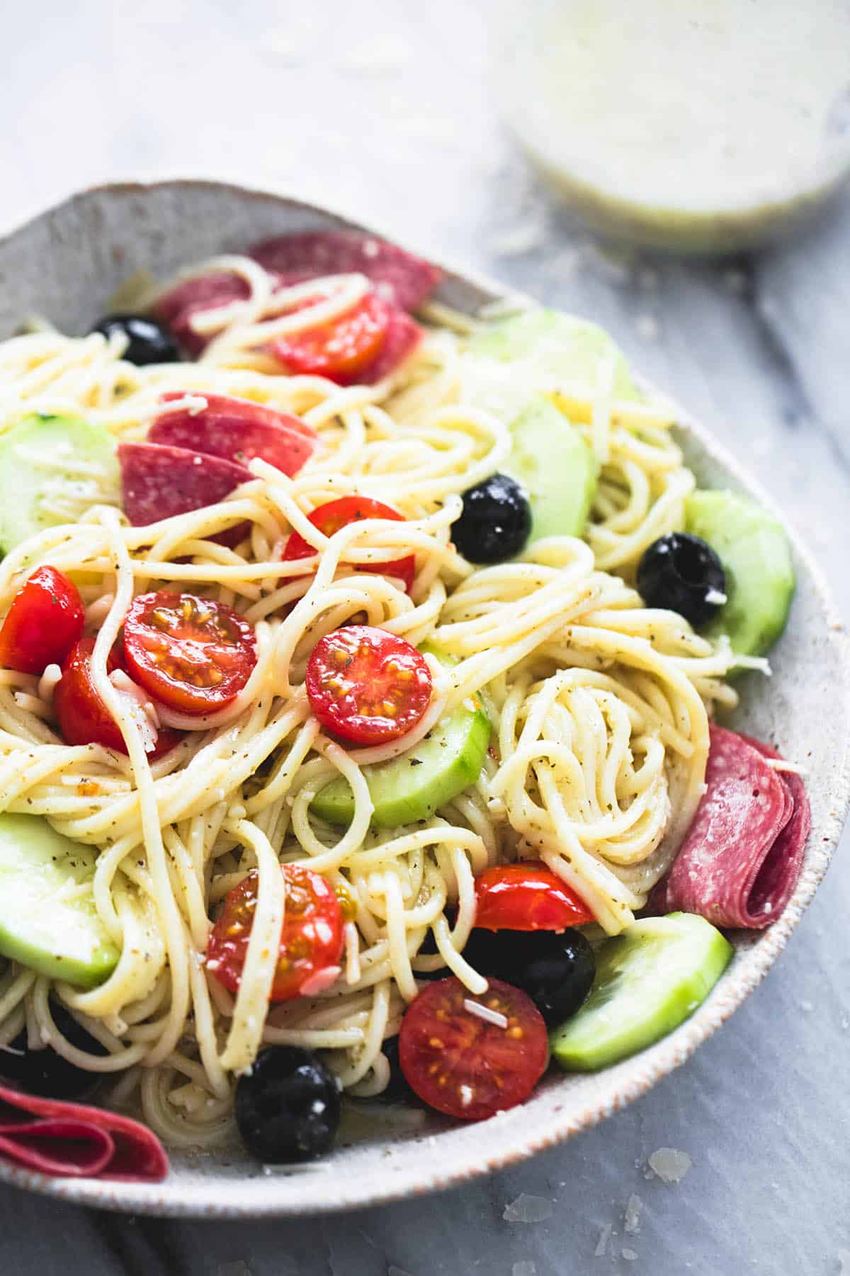 creamy Italian spaghetti pasta salad in a bowl.