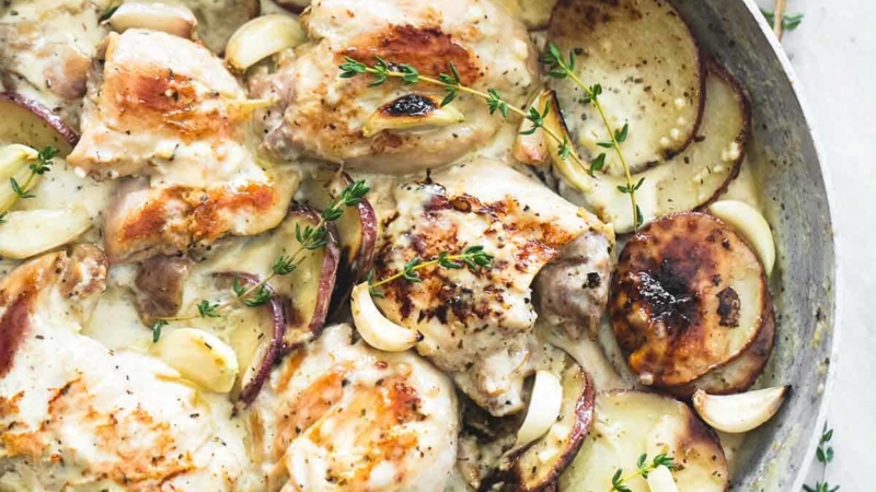 One Pan Creamy Garlic Herb Chicken & Potatoes | lecremedelacrumb.com