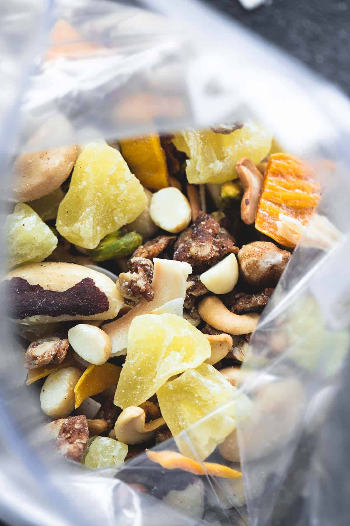 top view of tropical trail mix in a zip lock bag.