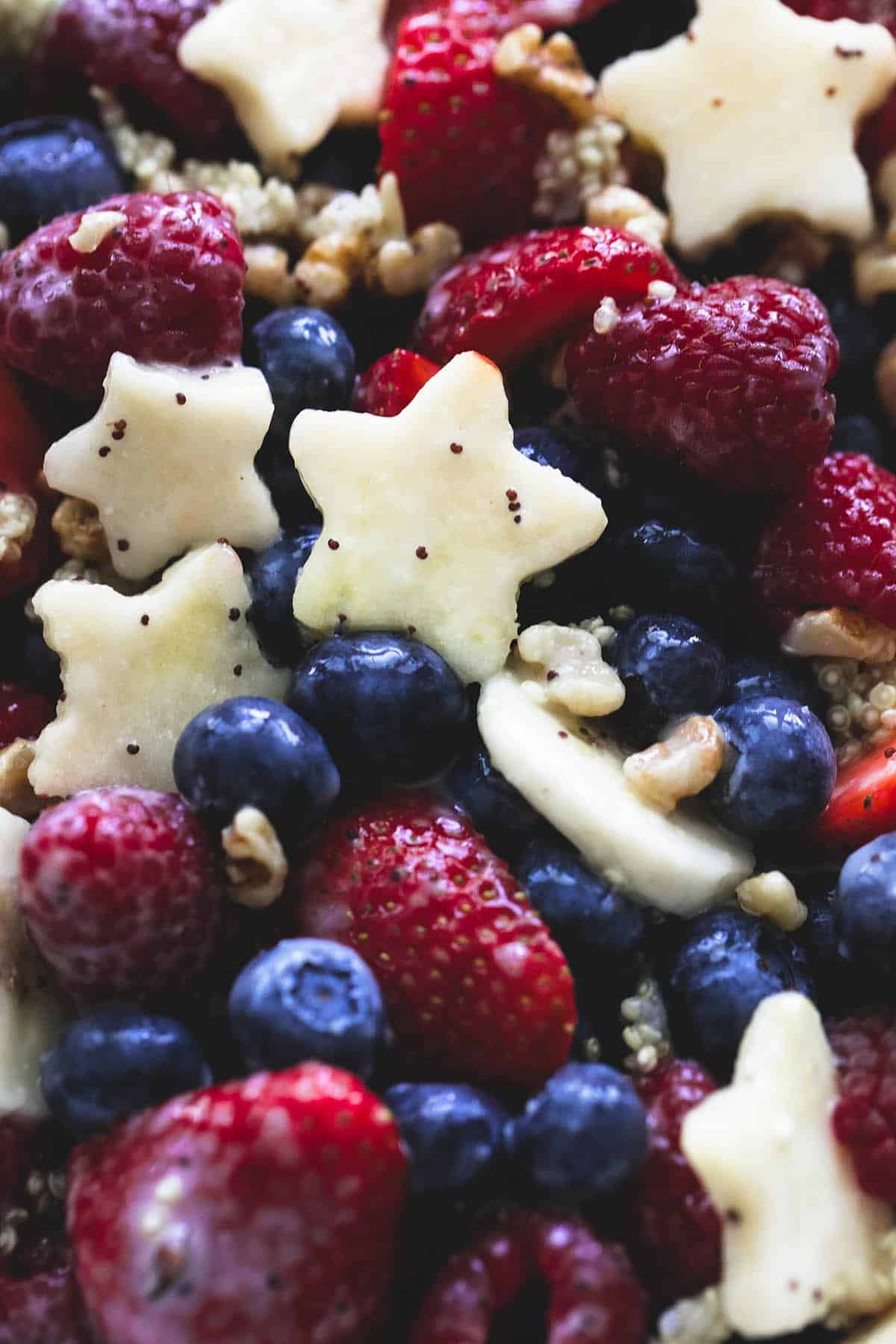 close up of Patriotic fruit salad with honey lime dressing.