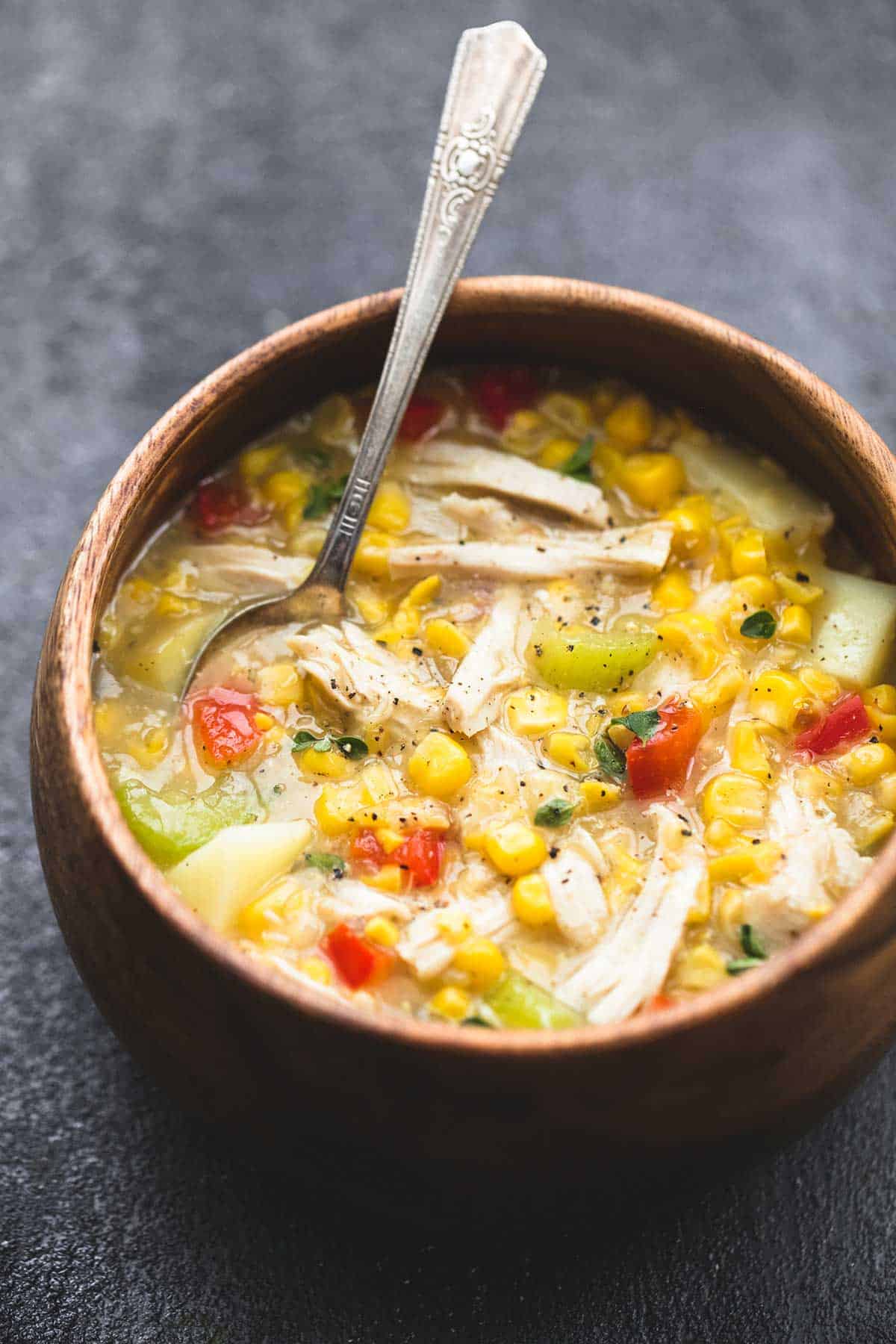 leftover turkey corn chowder with a spoon in a bowl.