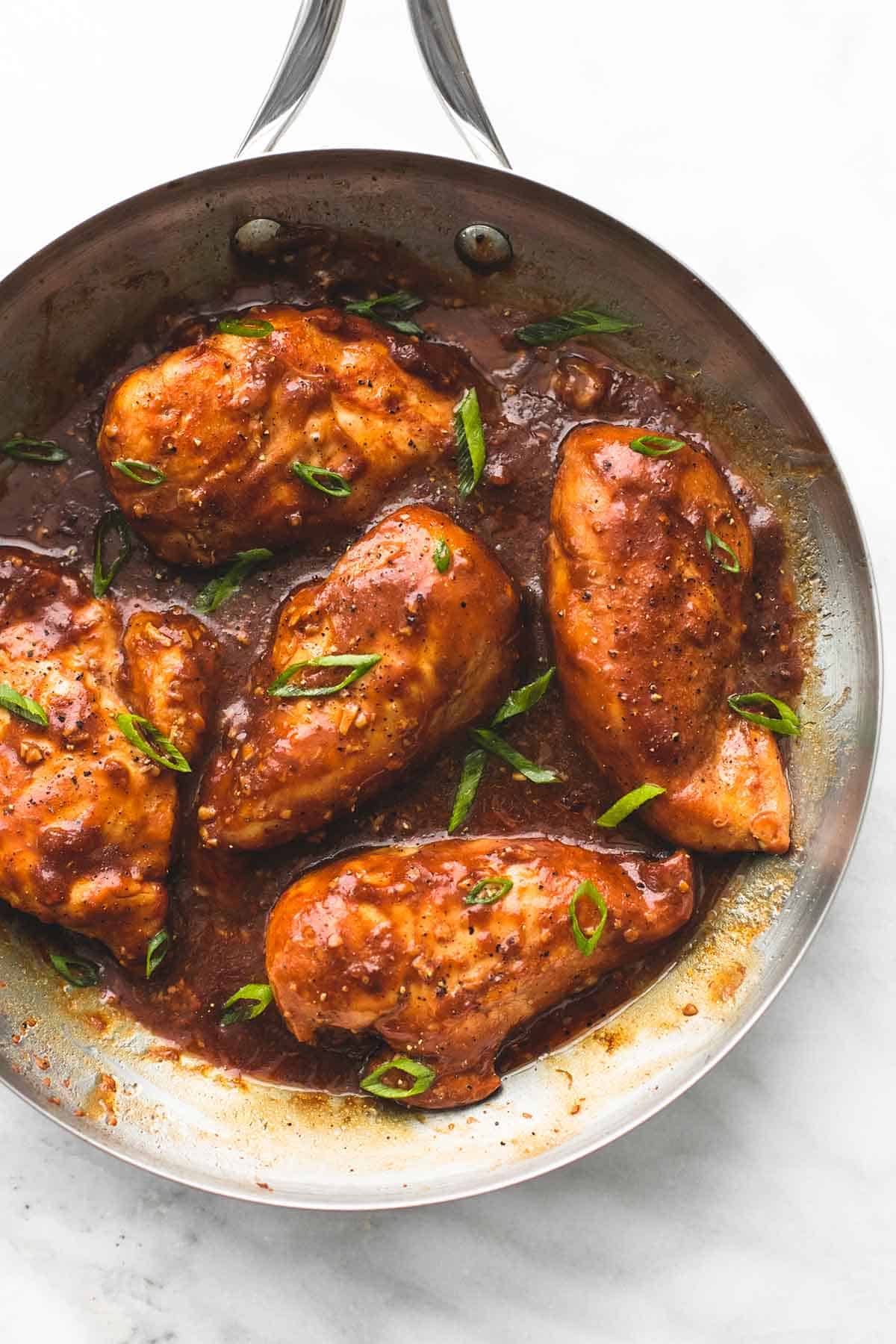 top view of chicken adobo in a pan.