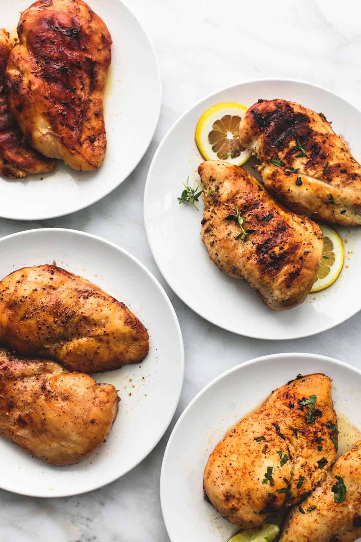 chicken on multiple plates with different marinades.