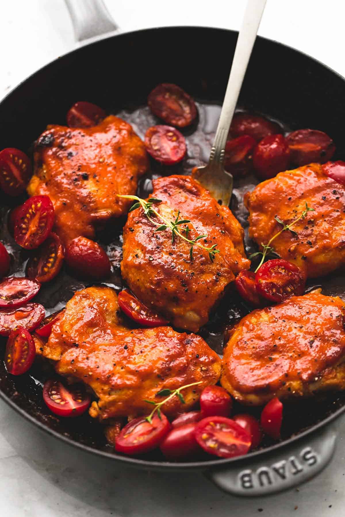 catalina chicken with a fork in a pan.