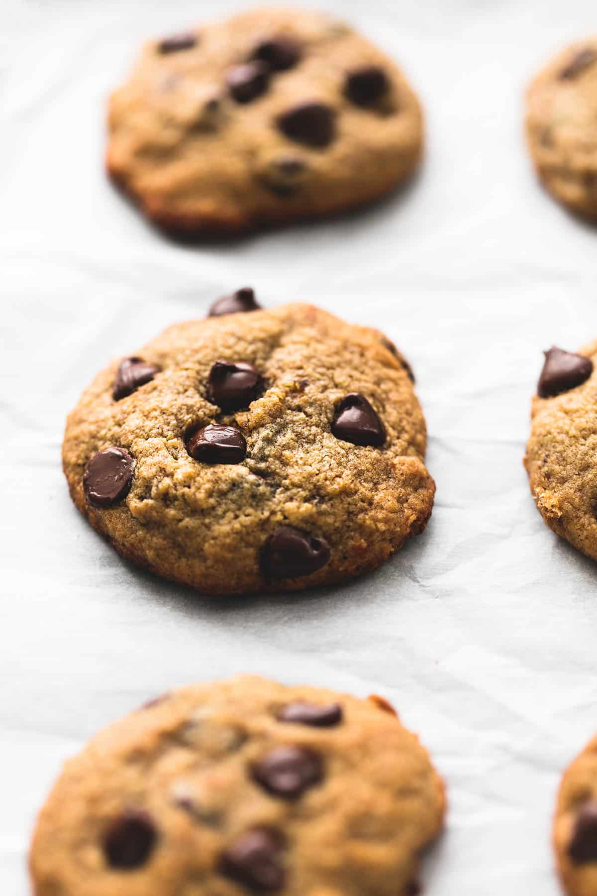 close up of banana chocolate chip cookies in rows.