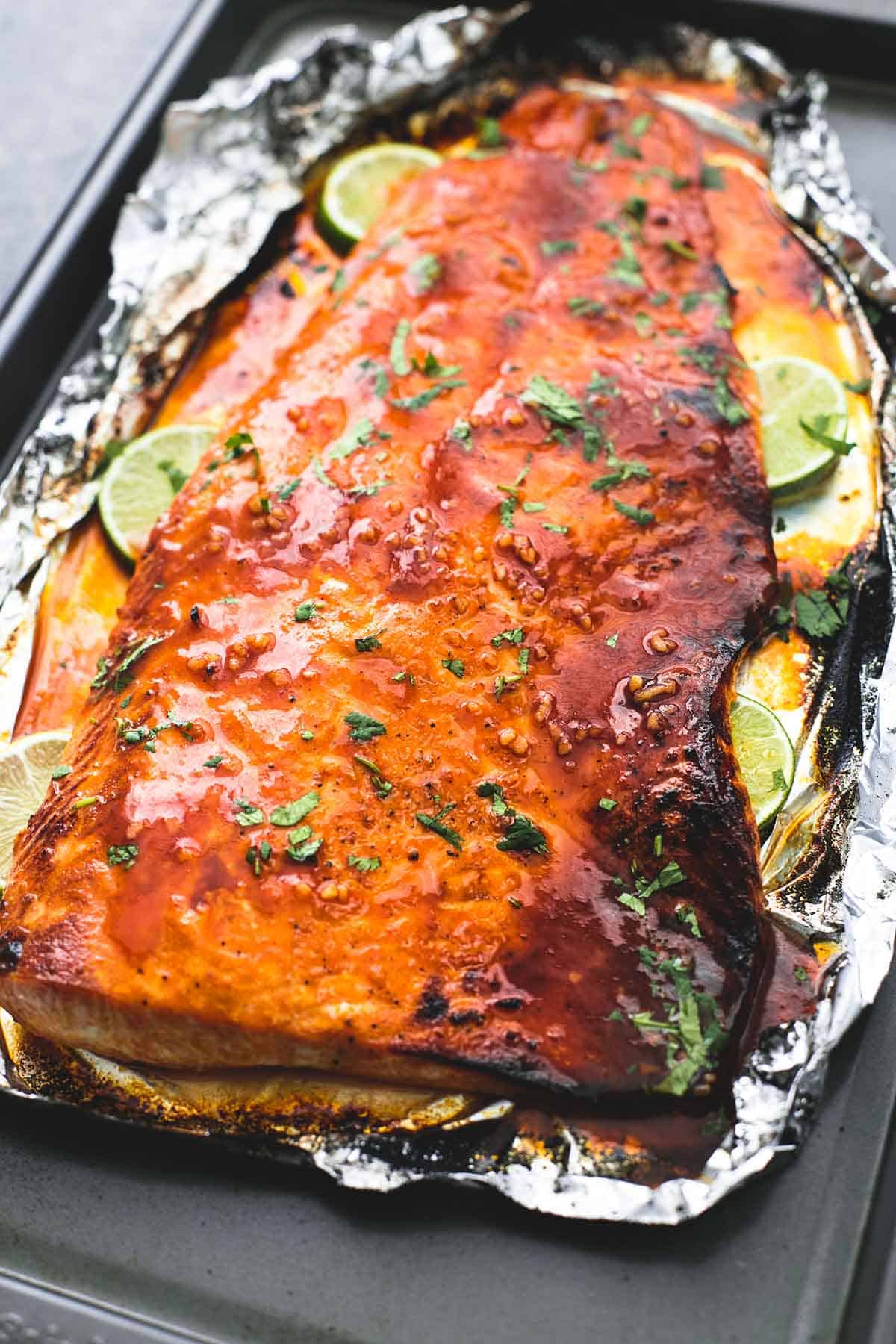 baked honey sriracha lime salmon on a baking sheet.