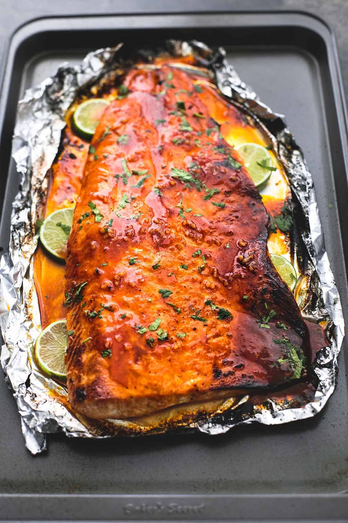 baked honey sriracha lime salmon on a baking sheet.