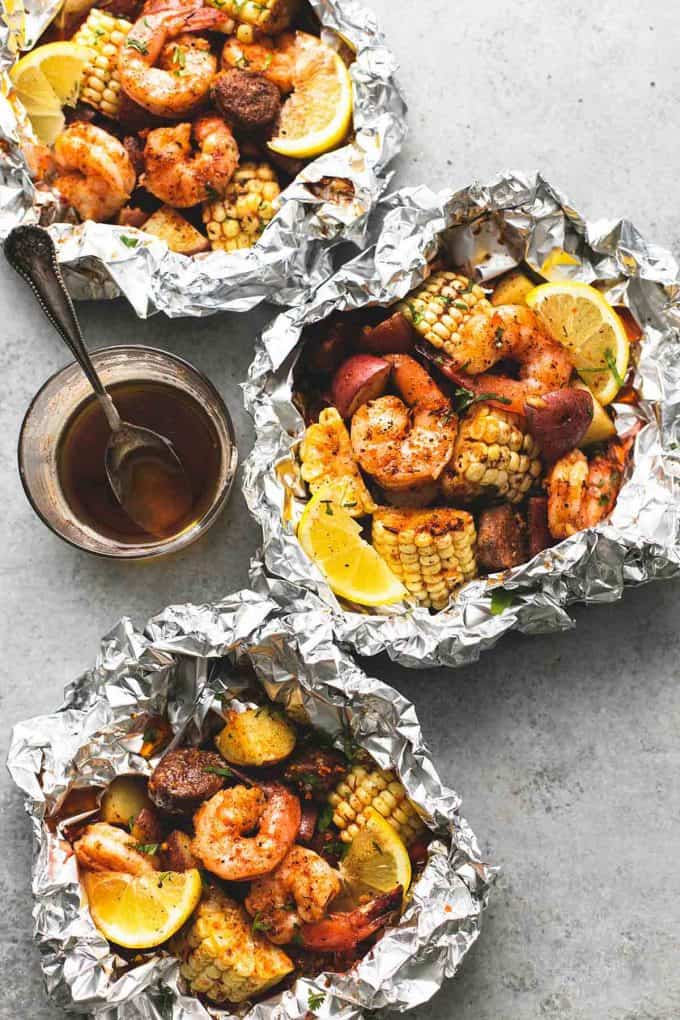 Easy, tasty shrimp boil foil packs baked or grilled with summer veggies