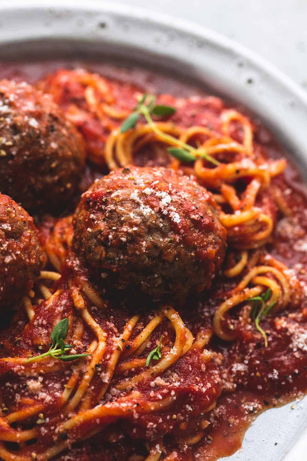 close up of slow cooker spaghetti and meatballs on a plate.