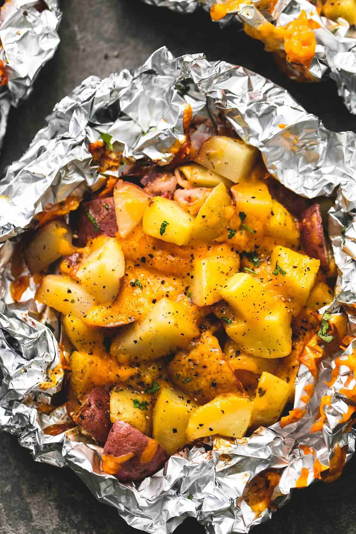top view of bacon cheddar potatoes in foil.