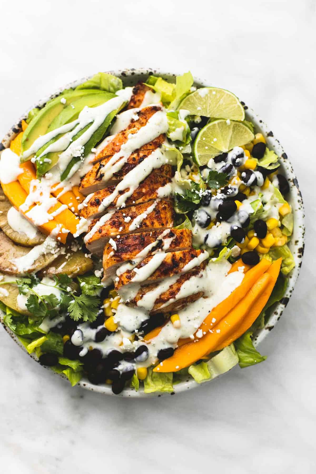 top view of Southwest mango pineapple chicken salad on a plate.