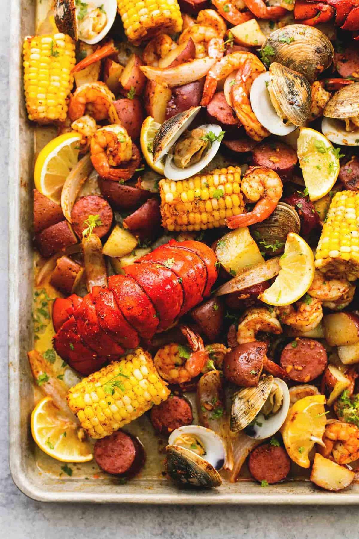 close up top view of sheet pan clambake on a sheet pan.