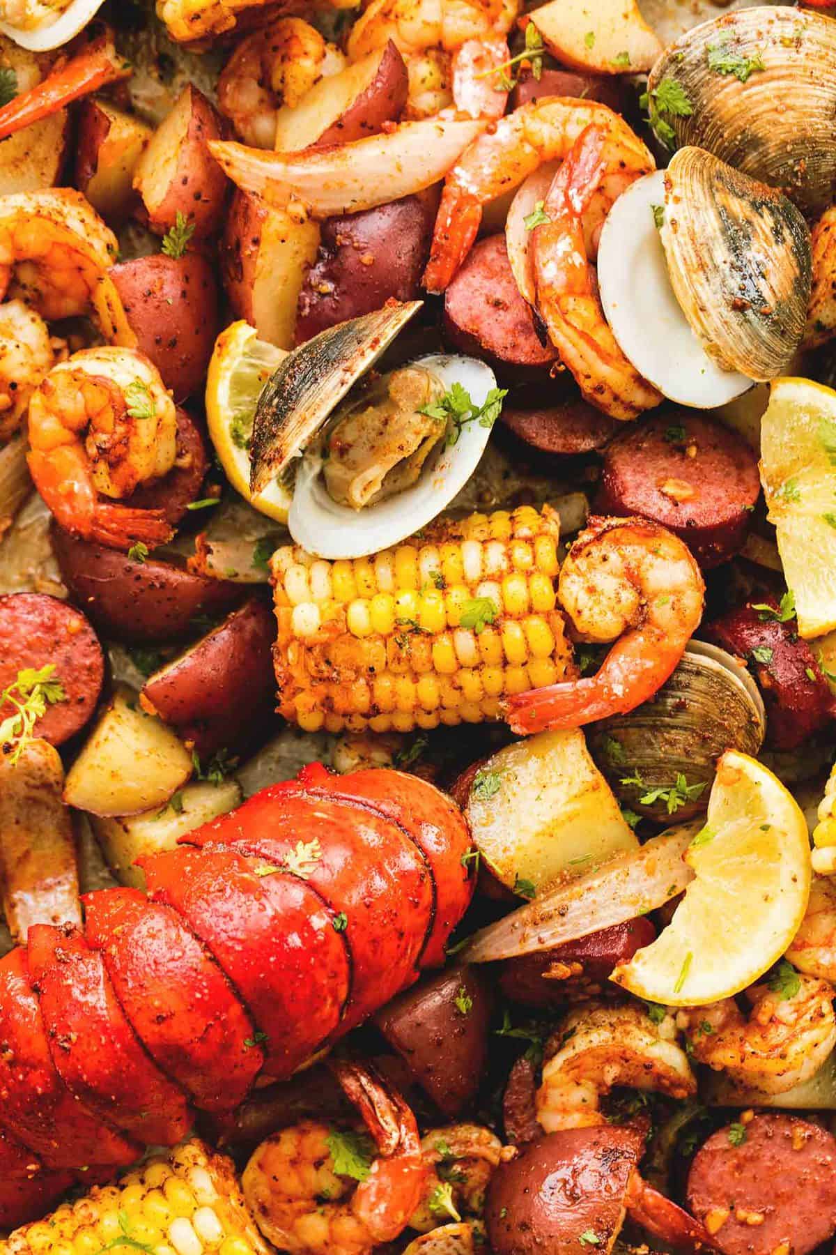 close up of sheet pan clambake.