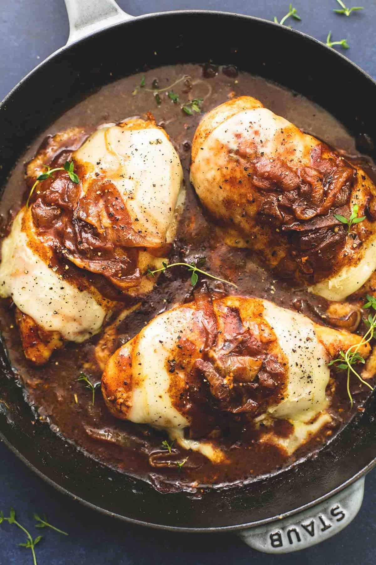 top view of French onion chicken in a skillet.