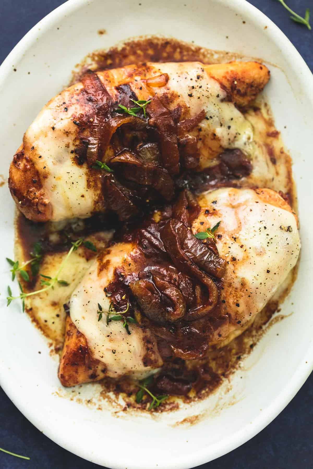 close up top view of French onion chicken on a plate.