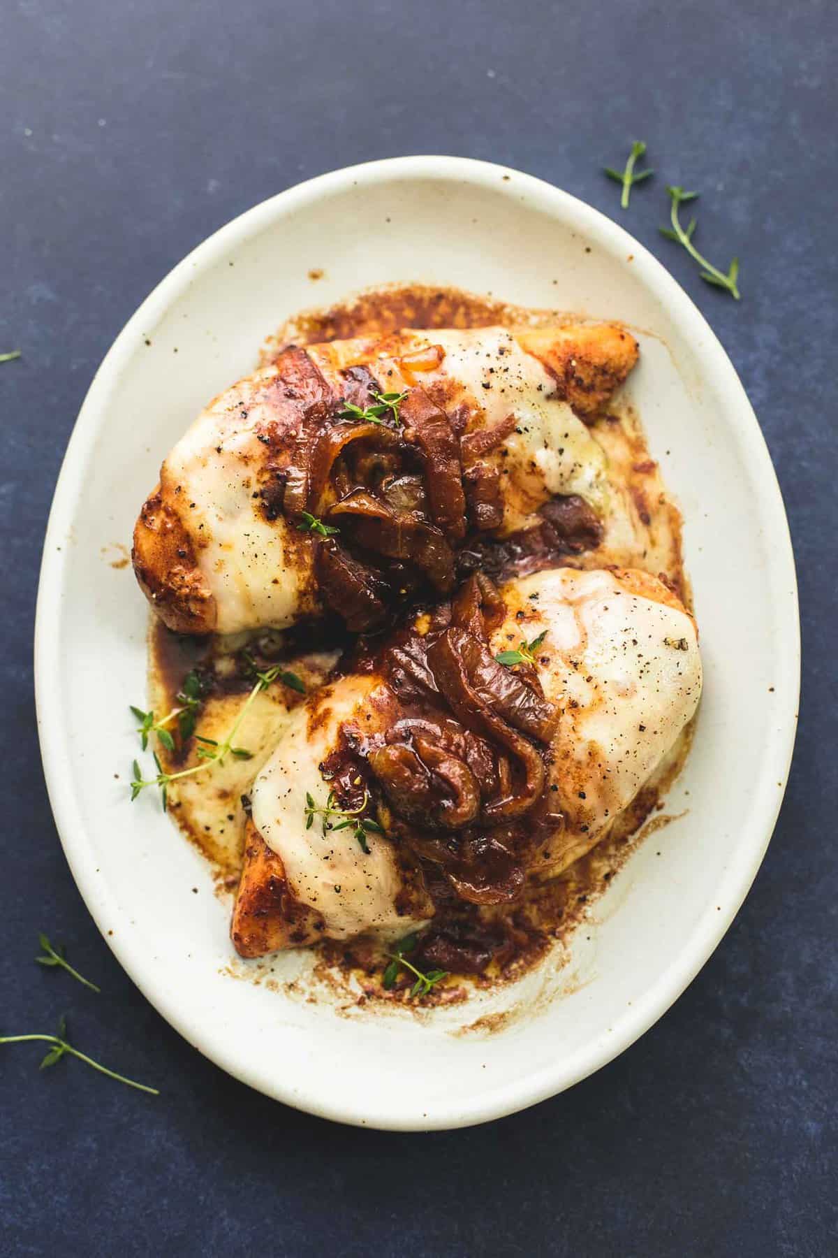 top view of French onion chicken on a plate.