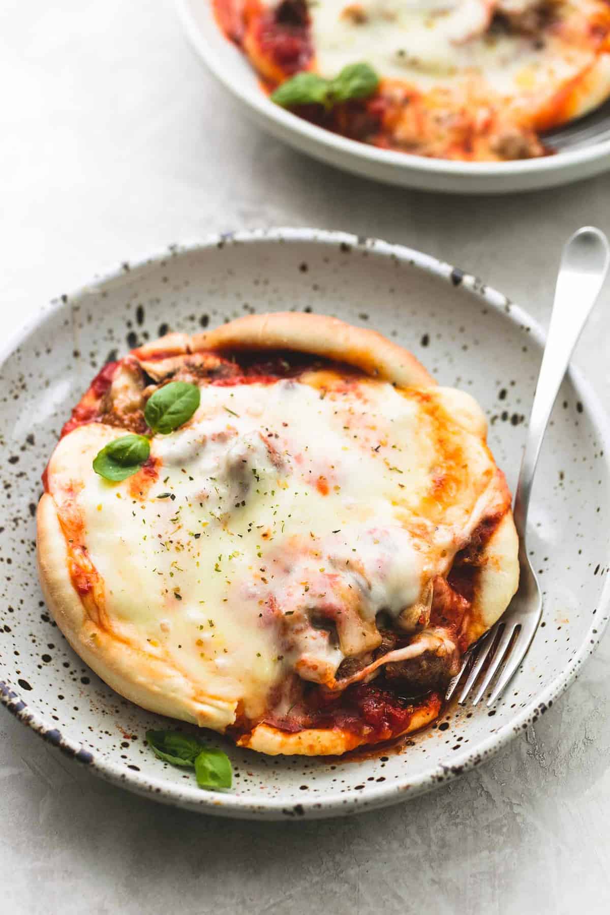 pizza pot pie with a fork on a plate.