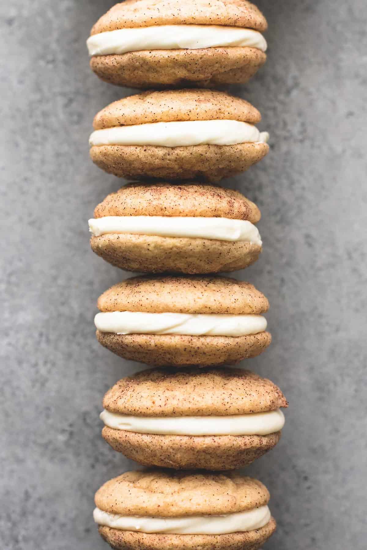 top view of eggnog snickerdoodle whoopie pies in a vertical row.