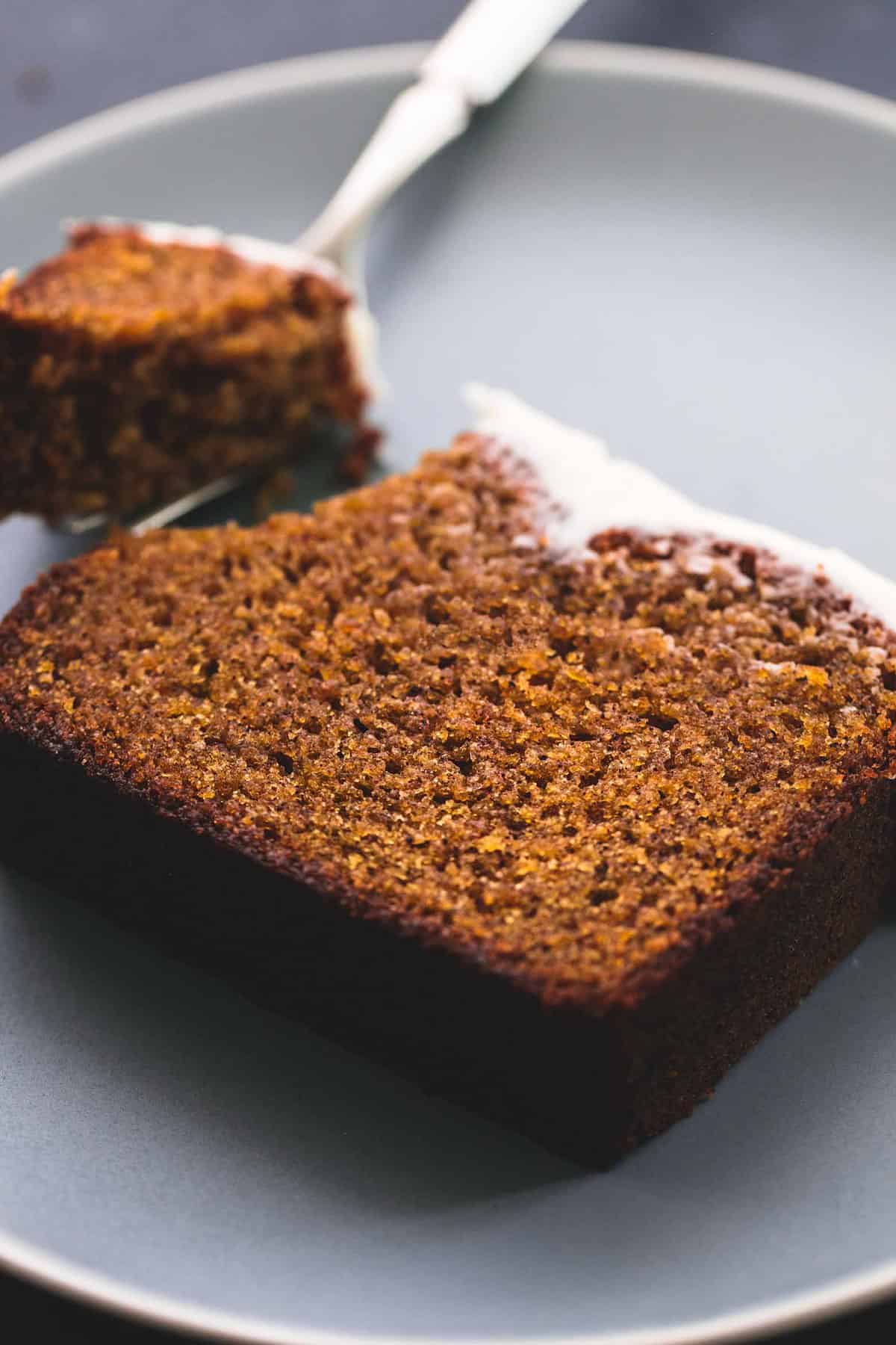Moist and flavorful, perfectly sweetened cream cheese frosted pumpkin bread is the ultimate treat for Fall. Easy to make, with simple ingredients, and that cream cheese frosting takes this perfect pumpkin bread over the top! | lecremedelacrumb.com