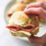Ham and Cheese Sliders on Buttery Herb Rolls | lecremedelacrumb.com