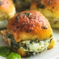 Pesto Mozzarella Chicken Sliders | lecremedelacrumb.com