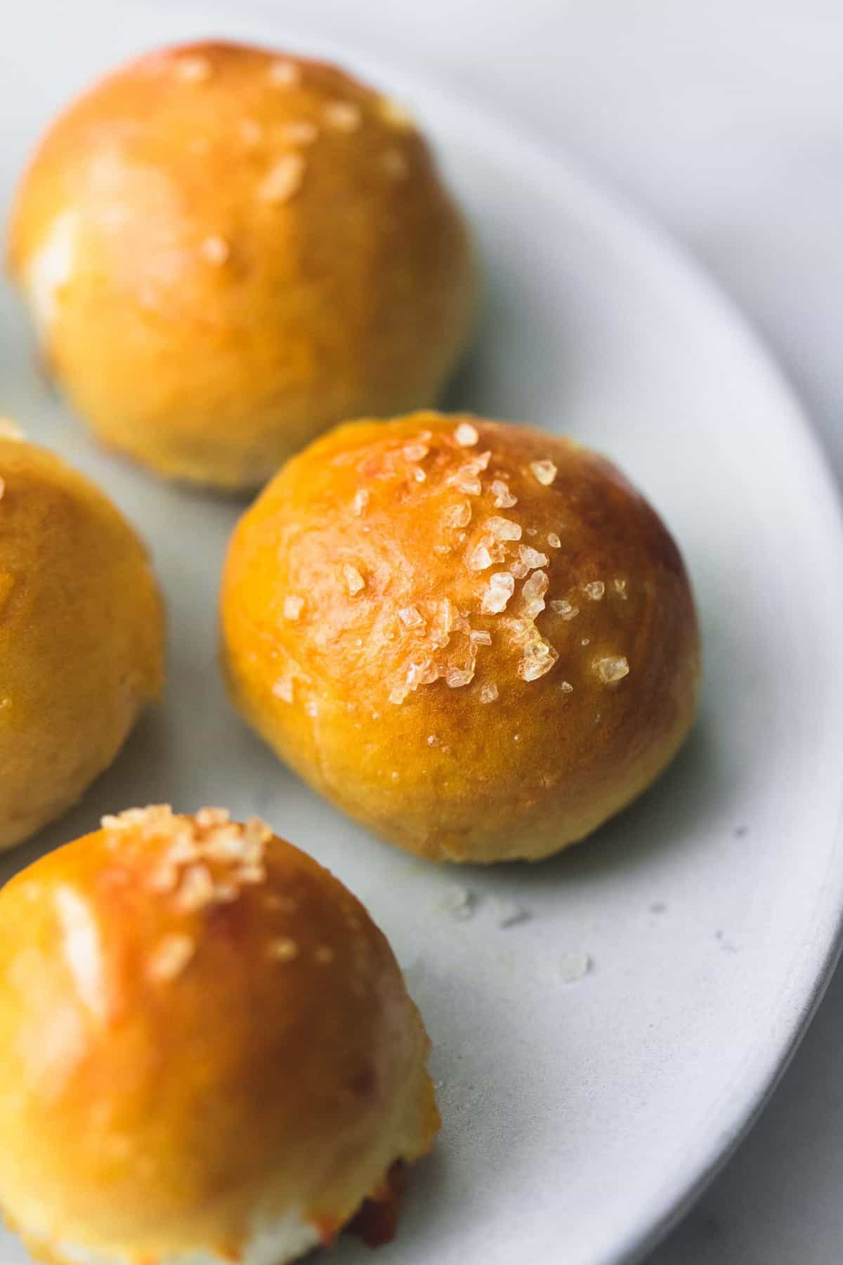 close up of cheddar jalapeño pretzel bites on a plate.