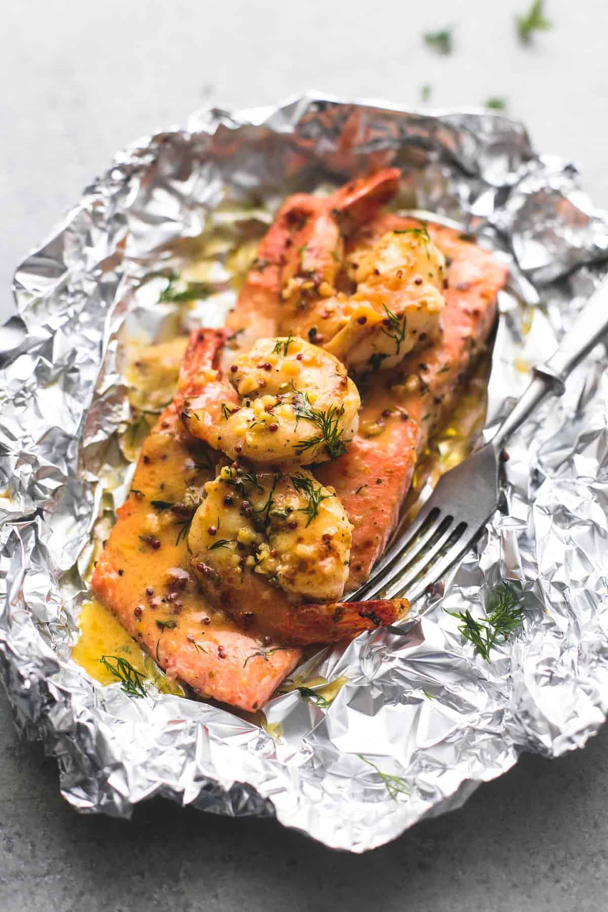 Garlic Dijon Shrimp & Salmon Foil Packs | lecremedelacrumb.com