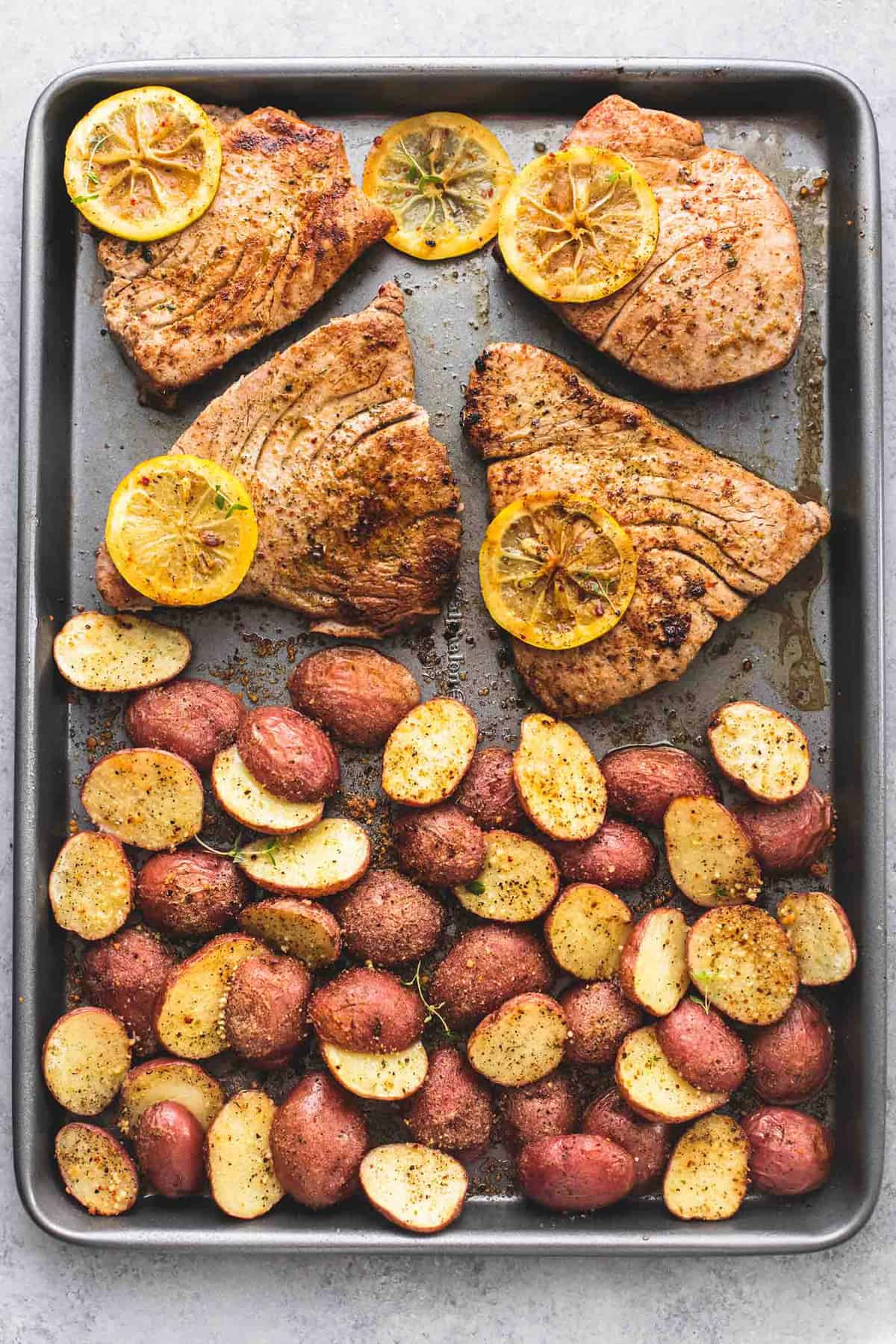 Sheet Pan Lemon Herb Tuna Steaks and Potatoes | lecremedelacrumb.com