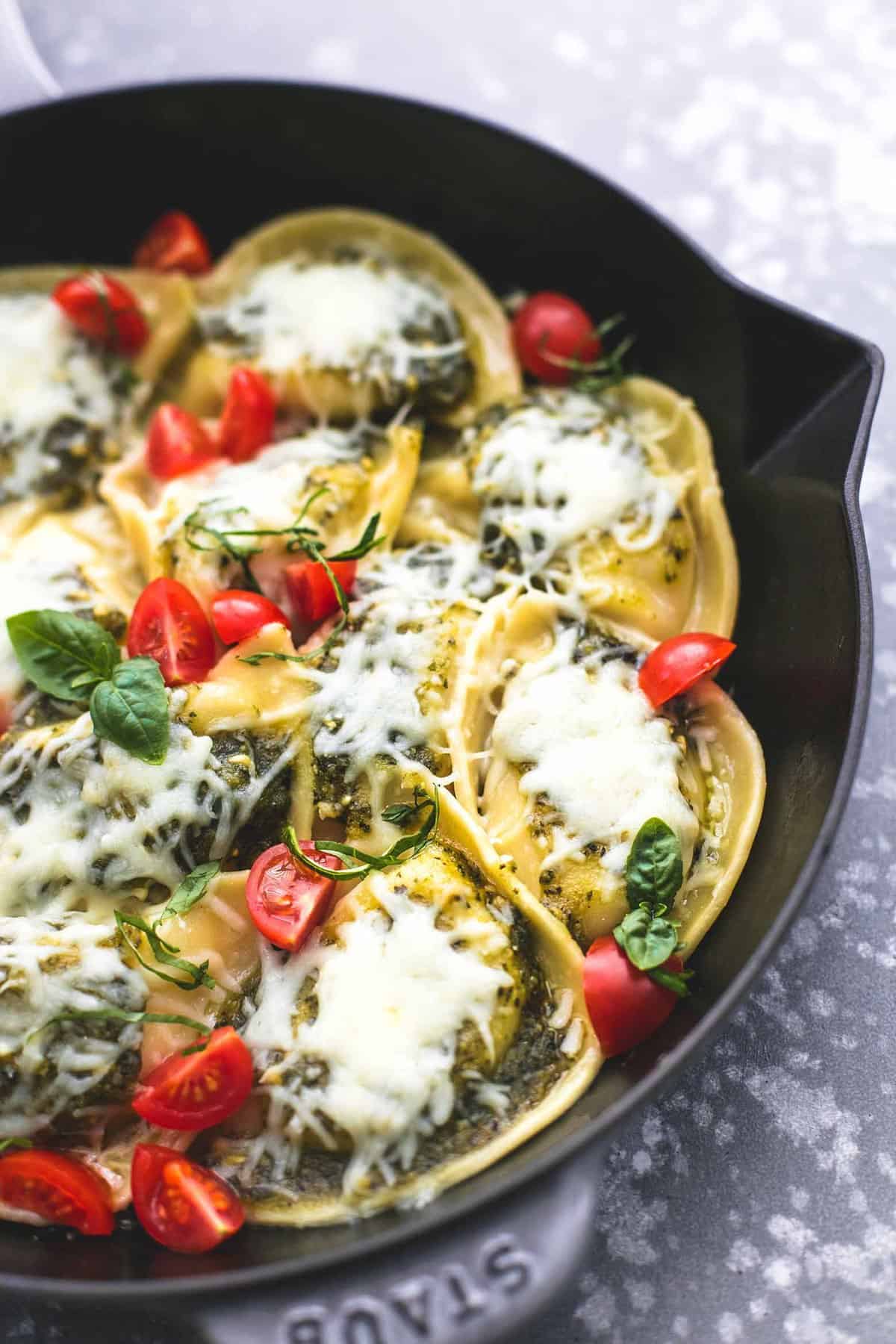 close up of margherita pierogies skillet in a skillet.