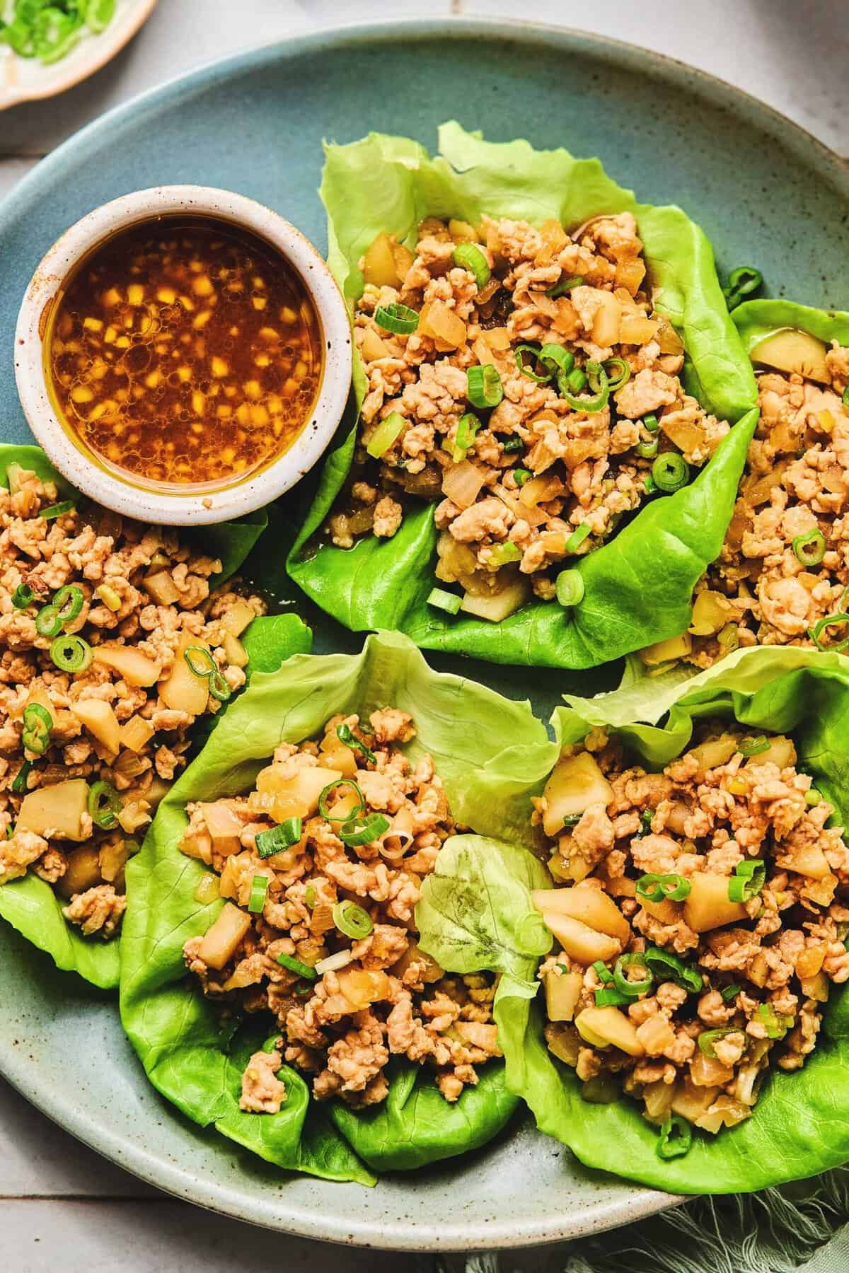 Overhead of Asian Chicken Lettuce Wraps on a plate.