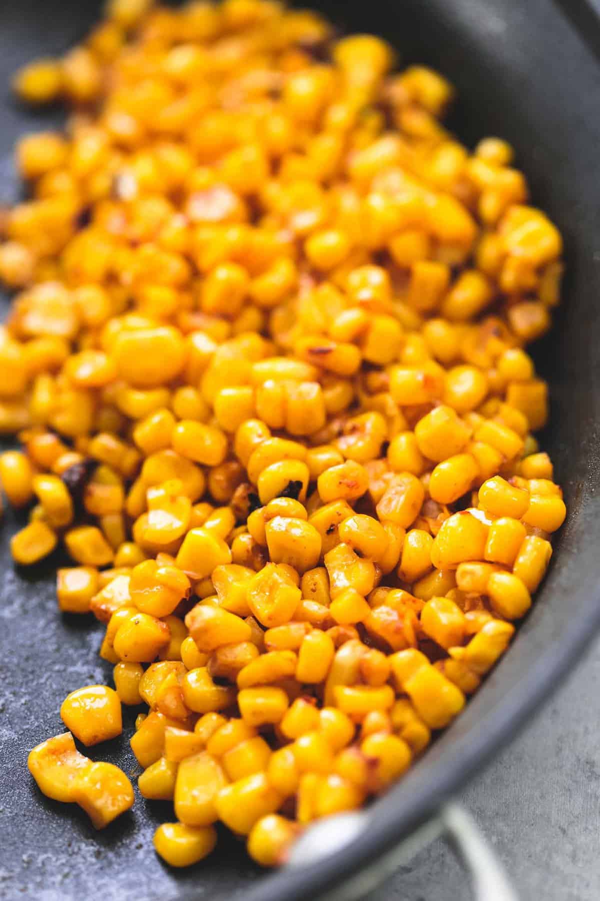 close up of corn in a pan.