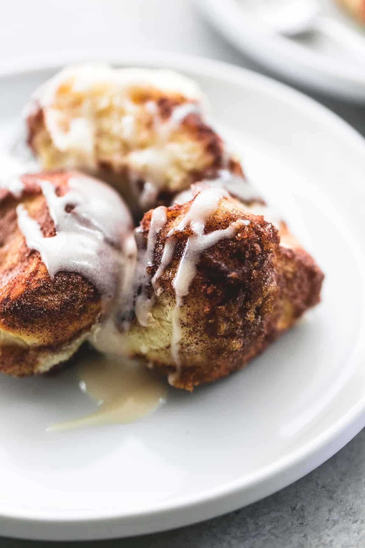 close up of cinnamon swirl monkey bread on a plate.