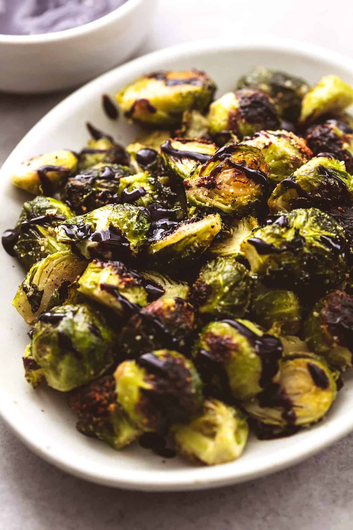 Easy Roasted Brussel Sprouts with Parmesan and Balsamic recipe | lecremedelacrumb.com