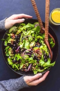 Best Simple Tossed Green Salad is the easiest side dish and goes perfectly with just about anything! Totally customizable and tossed in the tastiest 6-ingredient homemade dressing! | lecremedelacrumb.com